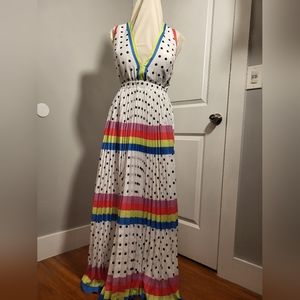 Very elegant and classy backless maxi dress. Perfect for garden parties.